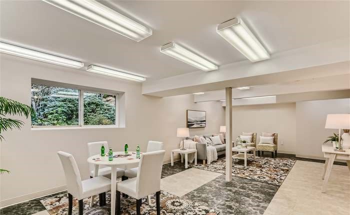 a room with a table and chairs