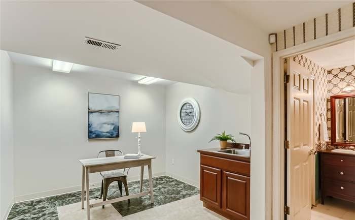 a room with a desk and chair