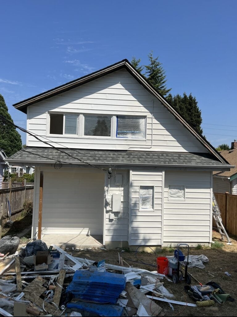 a house with a fence and a fence
