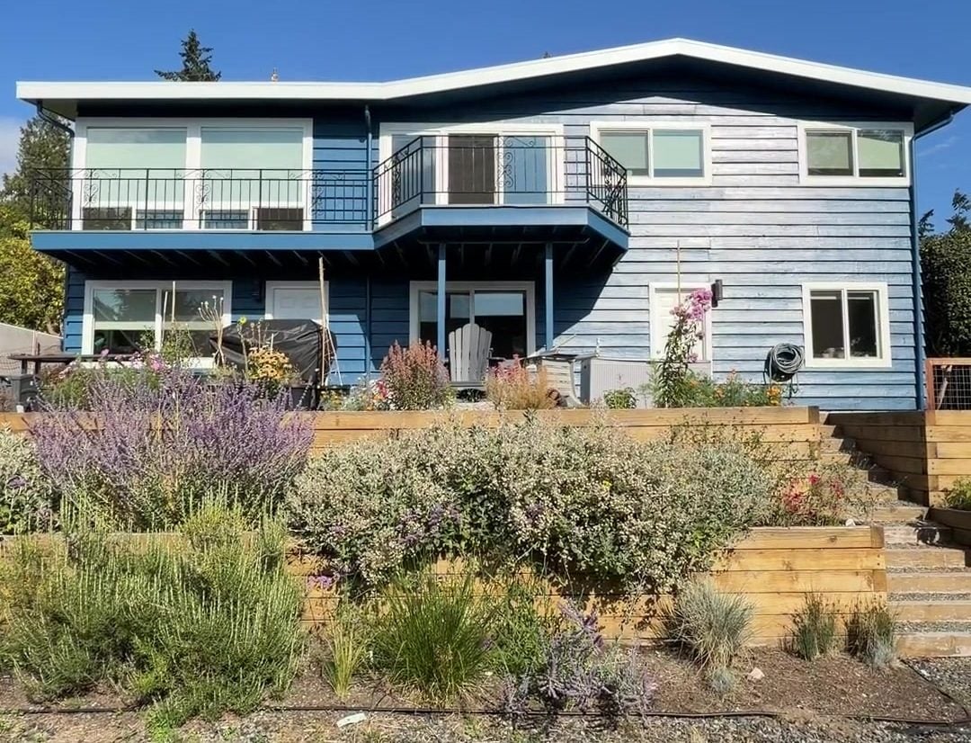 Back of the finished Edmonds house in navy, above the terraced garden