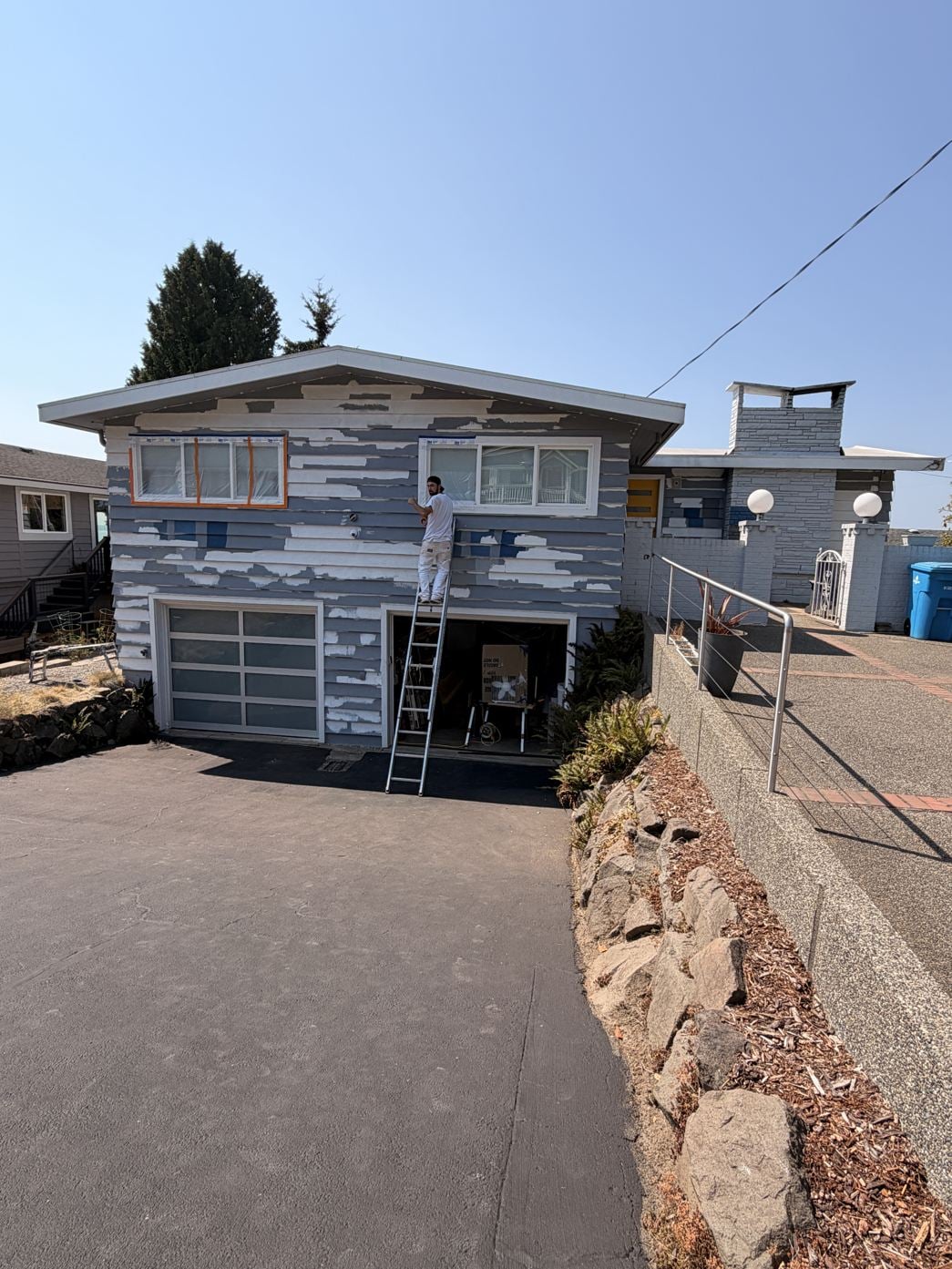 The same home scraped and primed mid-job