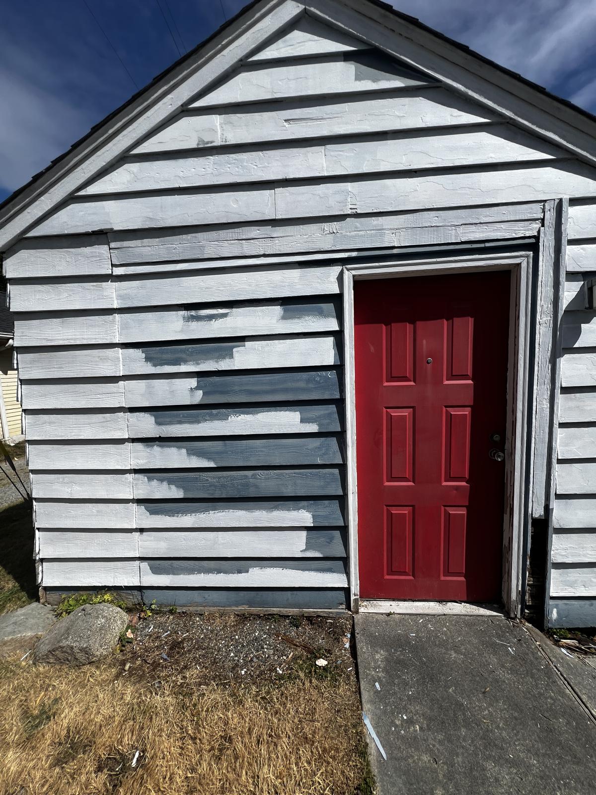 The same wall scraped and spot-primed