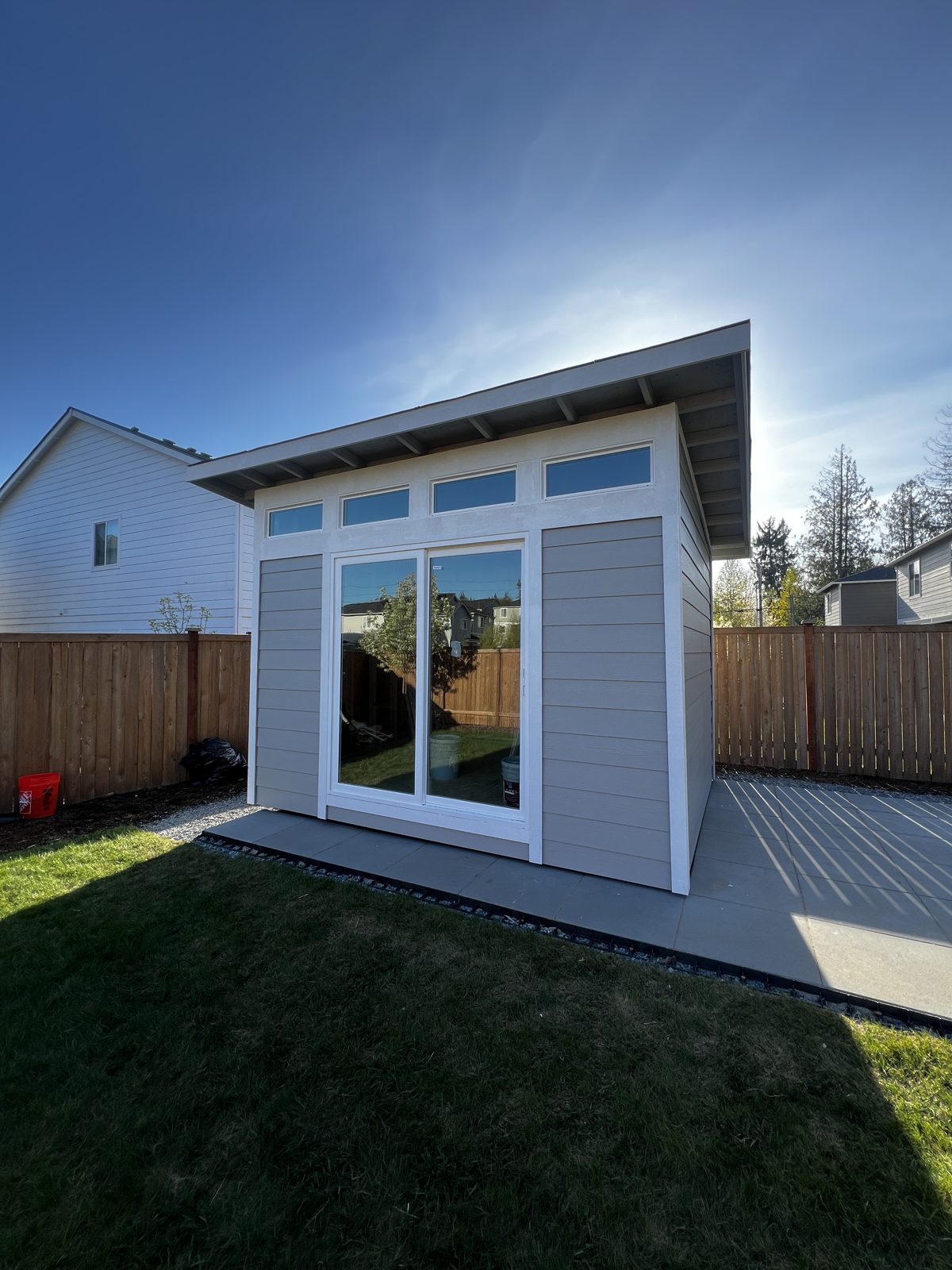 The same Everett studio painted light gray with white trim